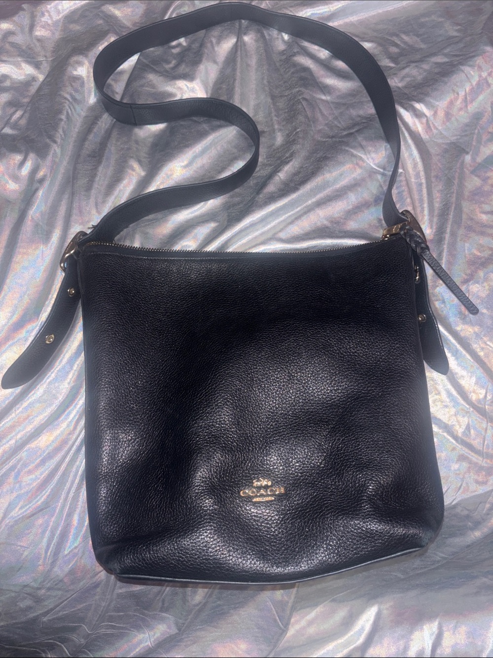 This bag is the Coach Val Duffle (Style Number C2818)